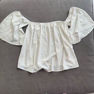 White off the shoulder blouse with puffy sleeves